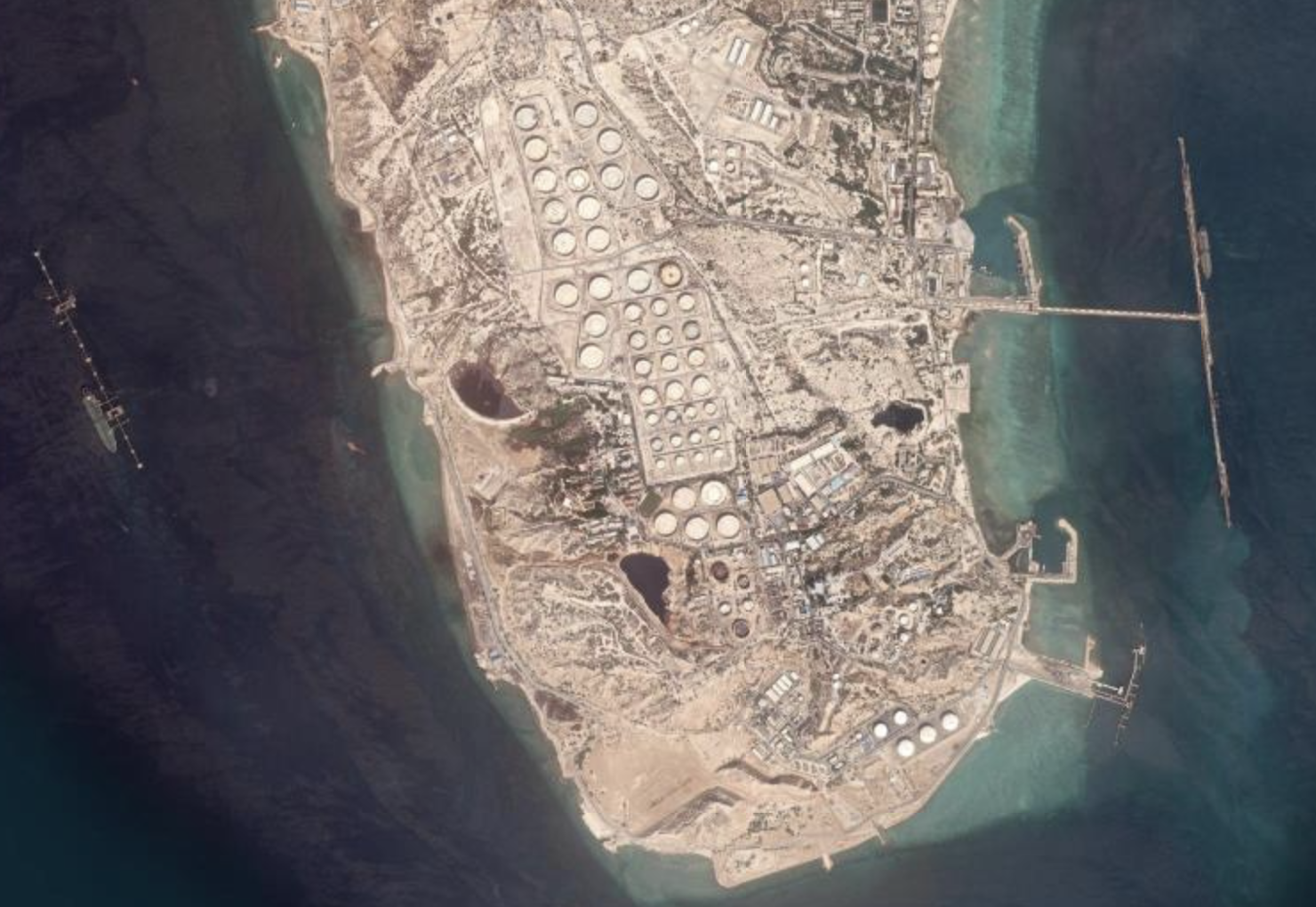 Kharg Island satellite view — floating-roof crude oil storage tanks